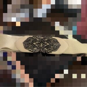 Elegant Beige elastic Belt with floral filigree buckle.